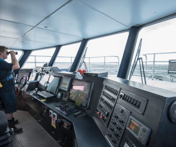 Captain at the bridge of marine research ship